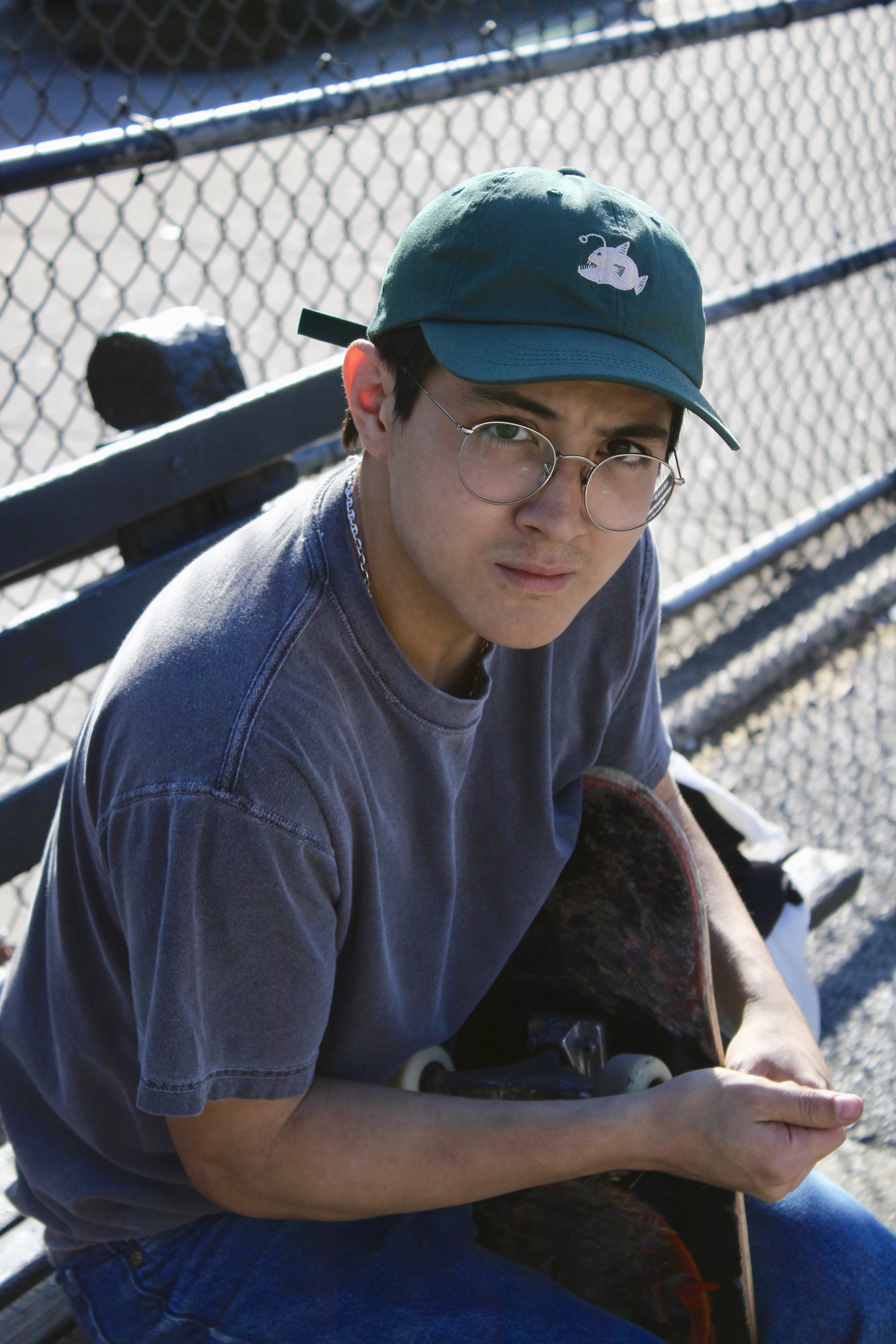 Bread staring directly at the camera wearing a cap
